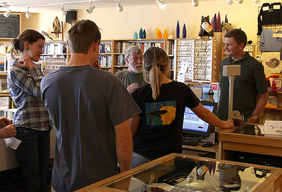 monologuesnyder1 Interns Claire, Nick, Nora, and Executive Director Geoff visit with Gary in the bookstore.