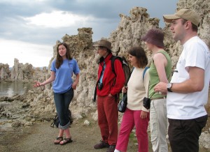 Mono Lake Committee intern Claire Skinner explains Mono Lake's history to a group of visitors at South Tufa. Photo by Elin Ljung.