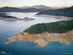 Shasta Lake, shrunk to 60 percent of its long-term level by three years of drought. Photo courtesy of National Geographic.