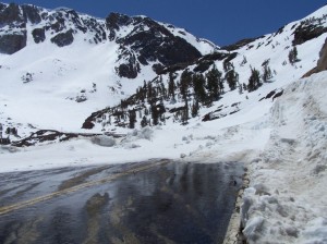 The end of the plowed road, just past the Green Bridge, with Ellery Bowl in the background. Photo taken 4/25/10. Highway 120 usually opens to the top by early May and through Yosemite National Park at the end of May. Photo by Greg Reis.