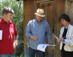 Geoff and the architects brainstorm ideas for the front of the store.