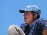 Intern Claudia Corona contemplates the view from Lembert Dome. Photo by Michael Clausen.