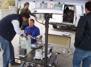 The drill (on top of the far end of the rover) is designed to be lightweight, yet strong enough to drill through basalt. Photo by Greg Reis. The drill (on top of the far end of the rover) is designed to be lightweight, yet strong enough to drill through basalt. Photo by Greg Reis.