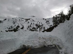 Yes, the road really is closed and covered in snow. May 7, 2011 photo at Tioga Lake by Greg Reis.