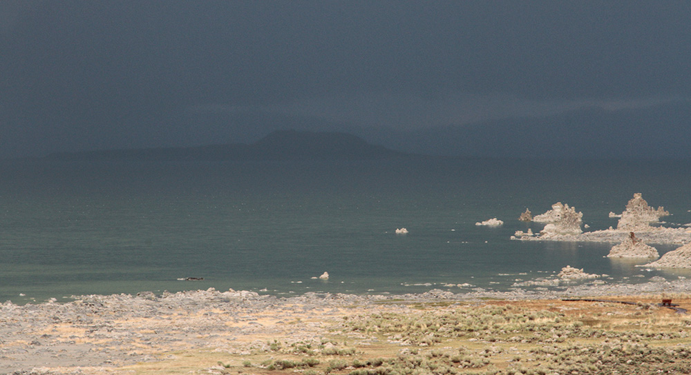 Negit Island, almost completely obscured by rain, on May 18. Photo by Arya Degenhardt.