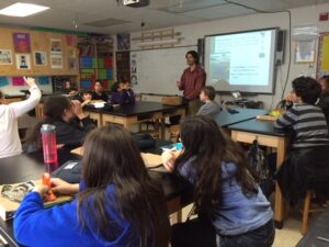 MLC Information & Restoration Specialist Greg Reis speaking to sixth graders at Ecole Bilingue Berkeley. Photo by Luis Santos.