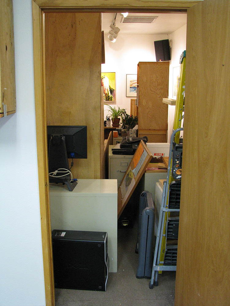 The gallery packed with office stuff as the office gets carpeted. Photo by Elin Ljung.