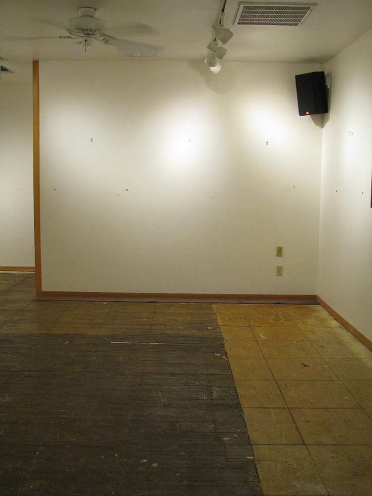 Removing the old carpet in the gallery revealed patches in the floor. Many years ago, snow built up on the roof and, when it melted, sent water running down the inside wall, rotting the original floor. Photo by Elin Ljung.