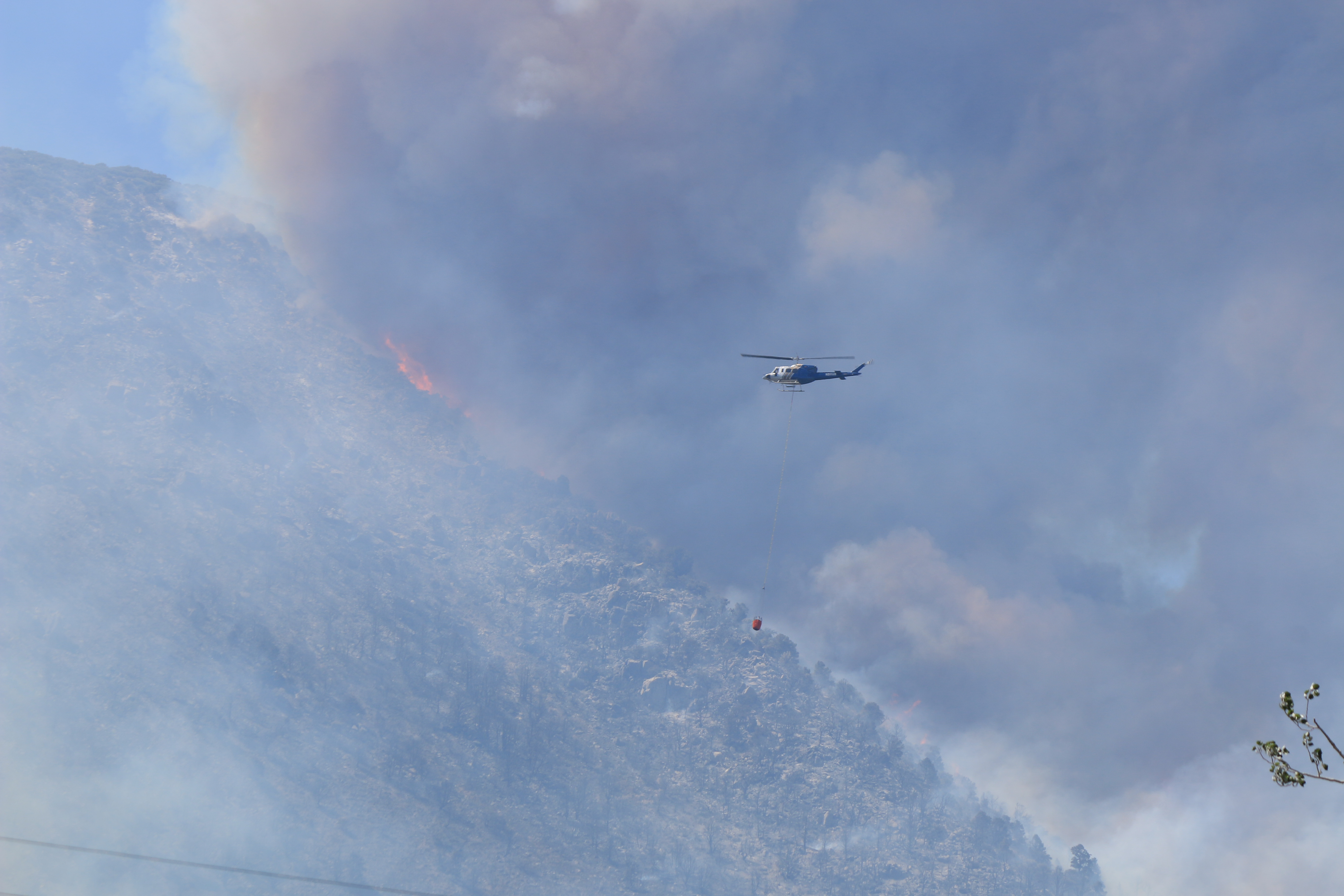 At times there have been four helicopters working on the Marina Fire and scooping water from Mono Lake. Photo by Bartshe Miller.