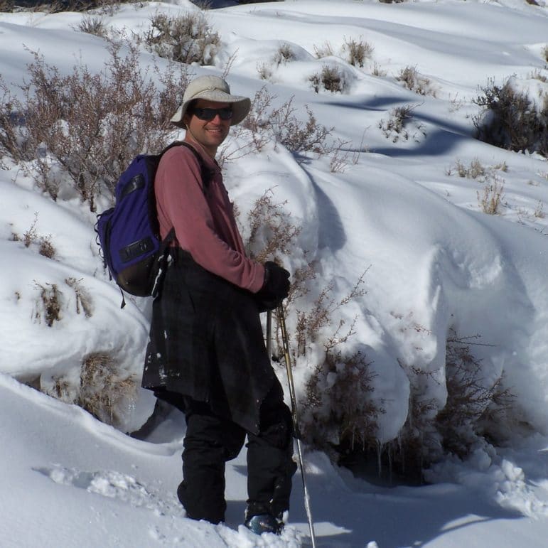 Greg Reis standing in a snowy landscape.