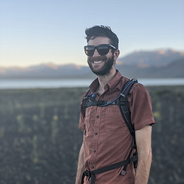 Head shot of Robert Di Paolo with Mono Lake in the background.