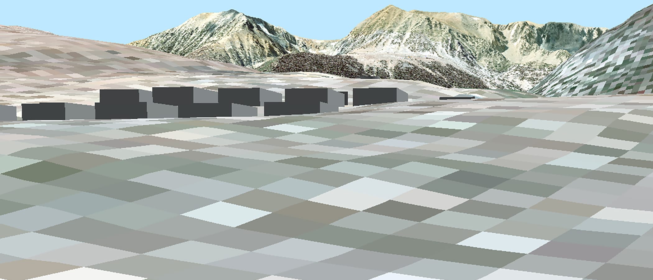 Computer generated simulation from the Tioga Inn project plans of the buildings as blocks on the digital-looking raised-relief landscape with the mountains of Tioga Pass in the distance.